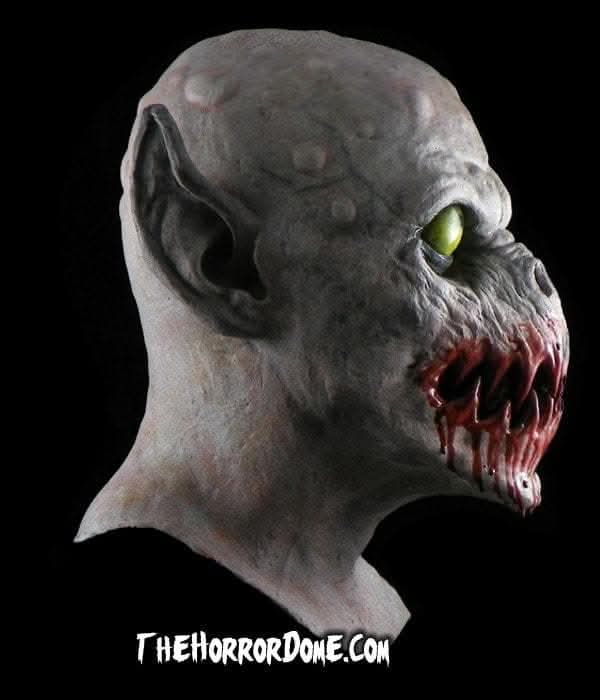 Feast Monster's distinct upturned snout and bumpy skull design"