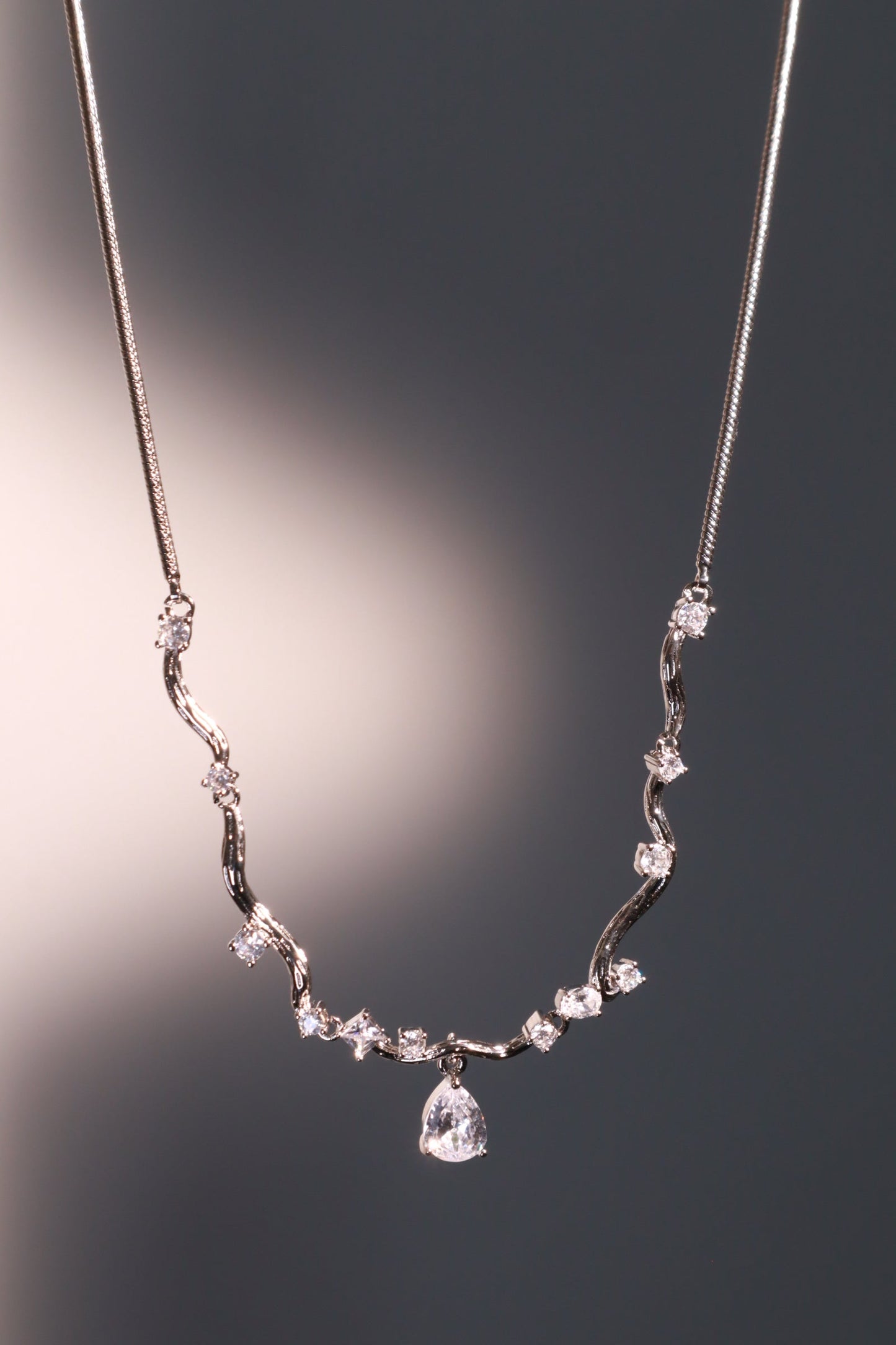 Palladium White Gold Plated Spiral Drop Necklace