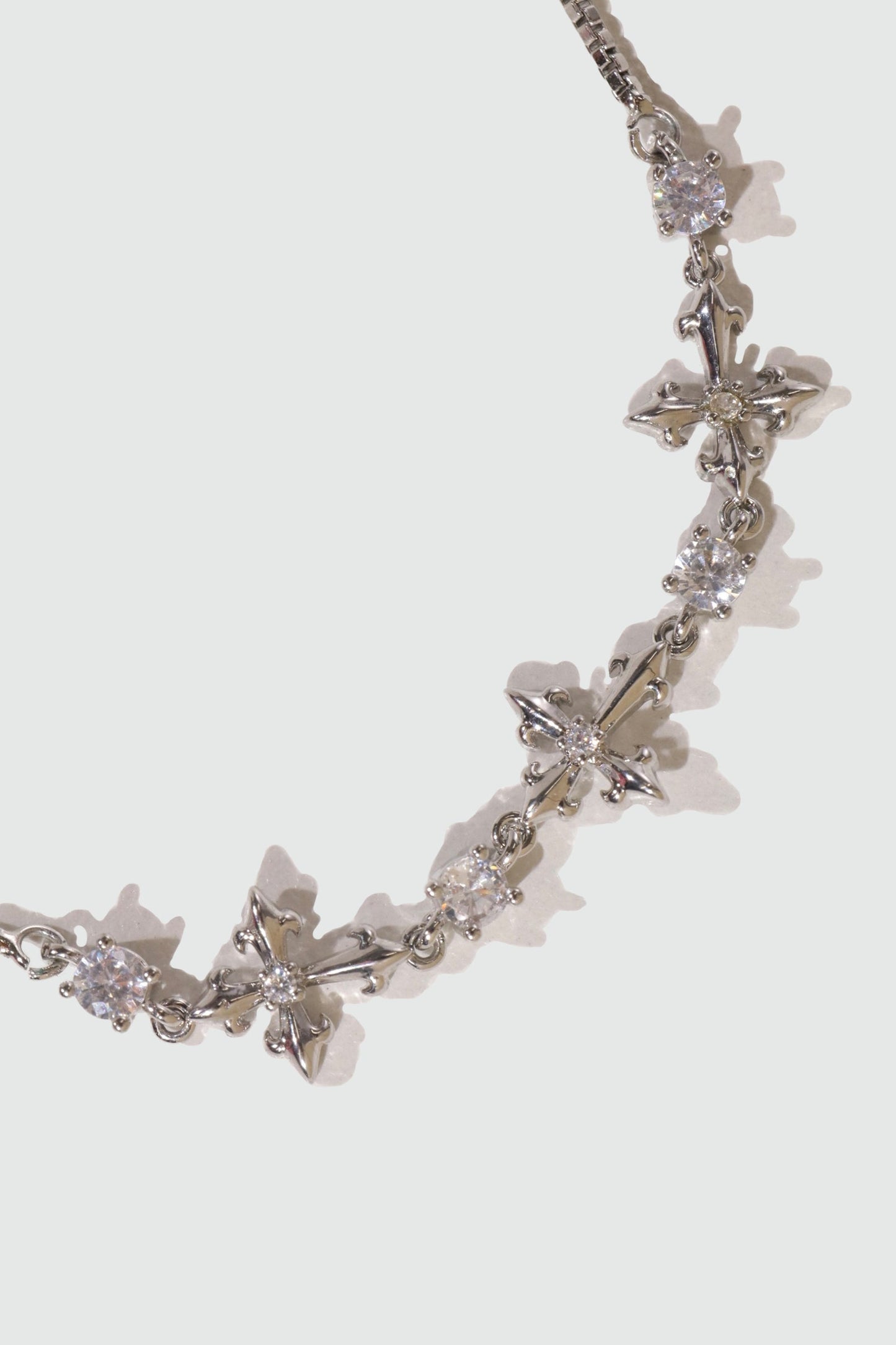 Palladium White Gold Plated Multi Diamond Cross Bracelet