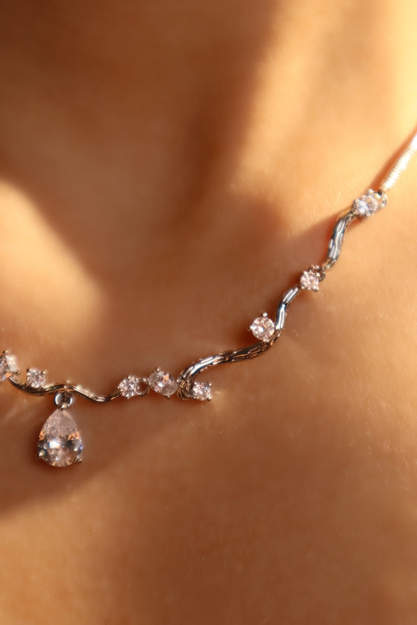 Palladium White Gold Plated Spiral Drop Necklace
