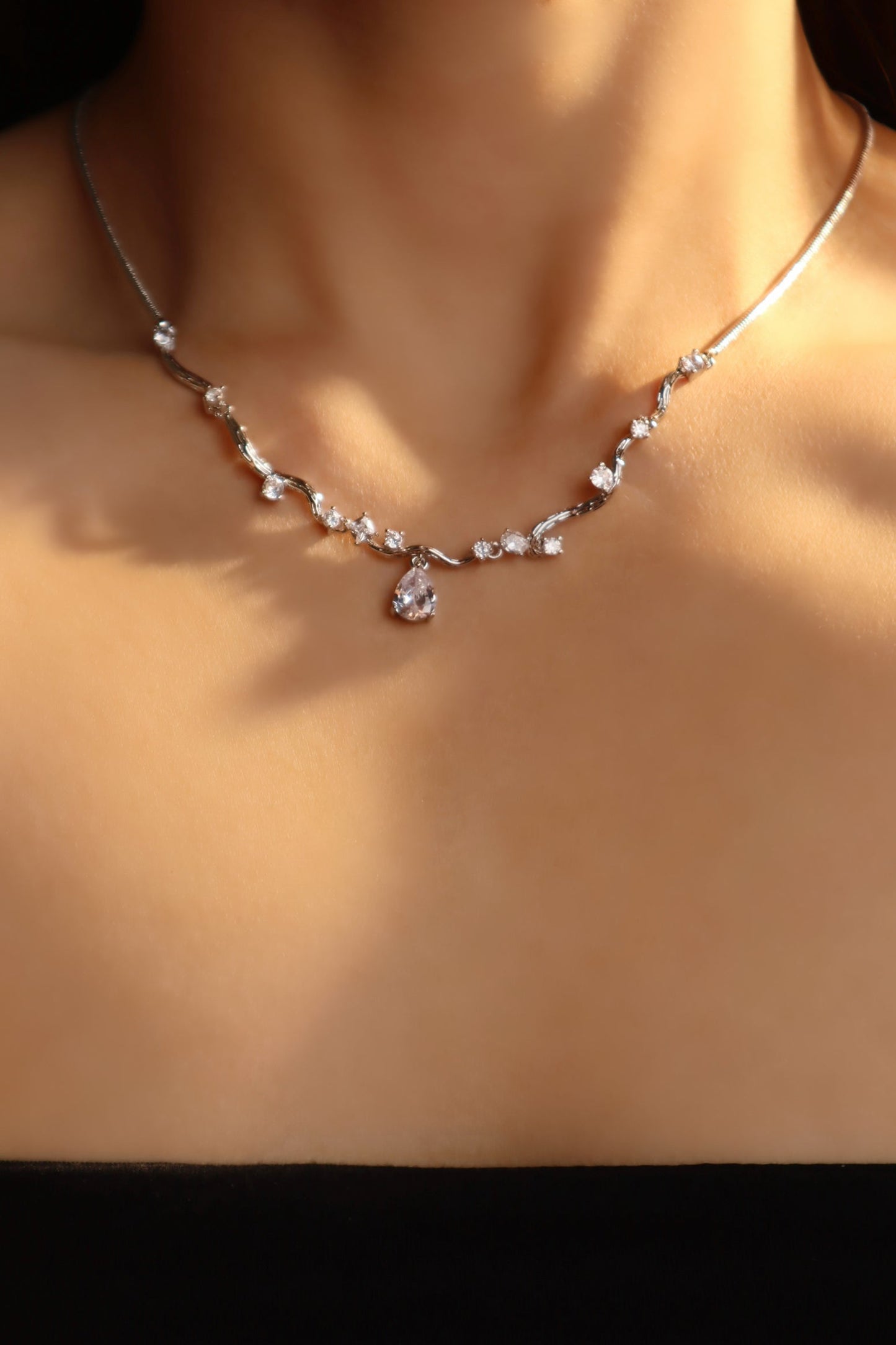 Palladium White Gold Plated Spiral Drop Necklace