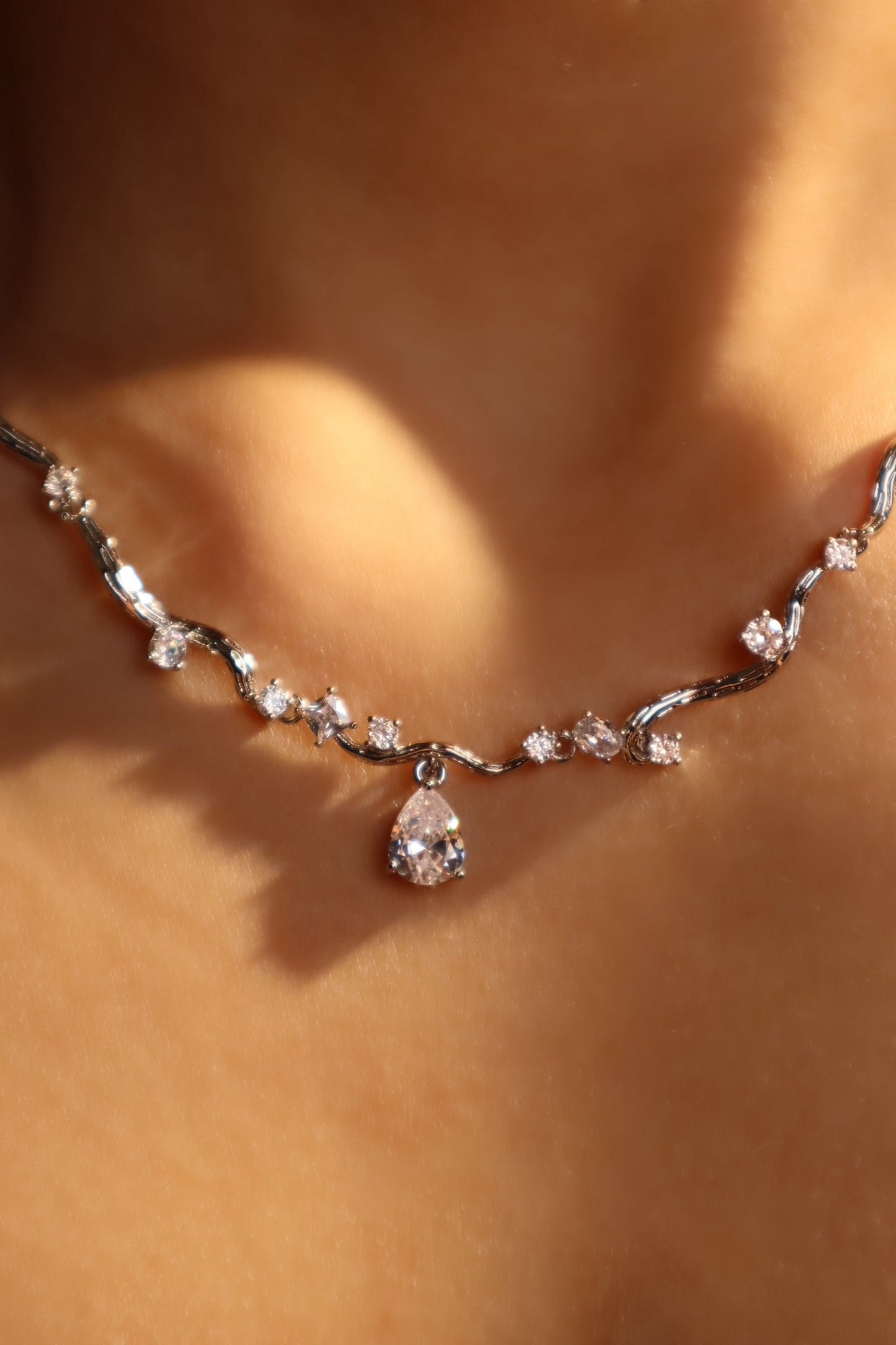 Palladium White Gold Plated Spiral Drop Necklace