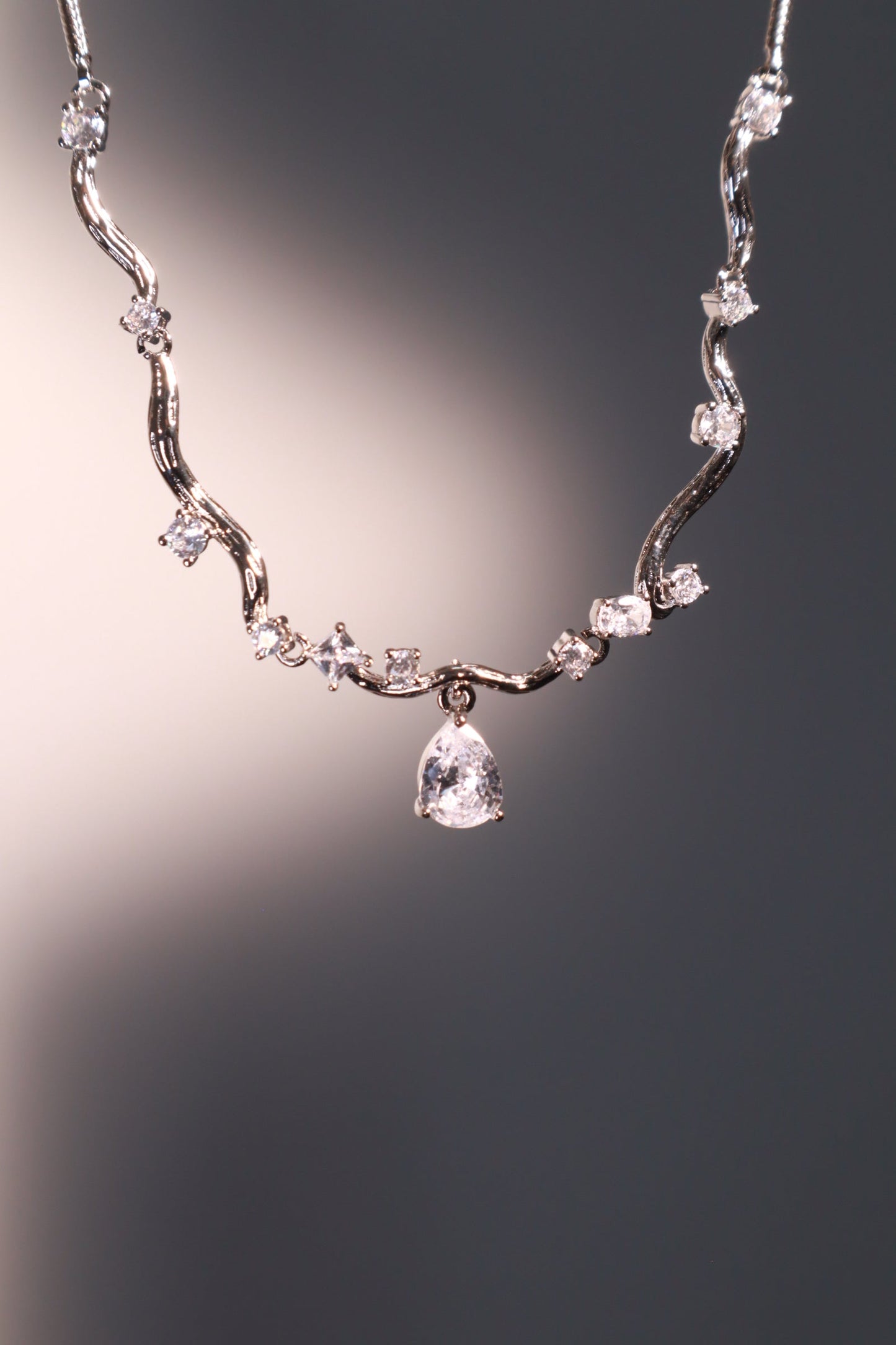 Palladium White Gold Plated Spiral Drop Necklace