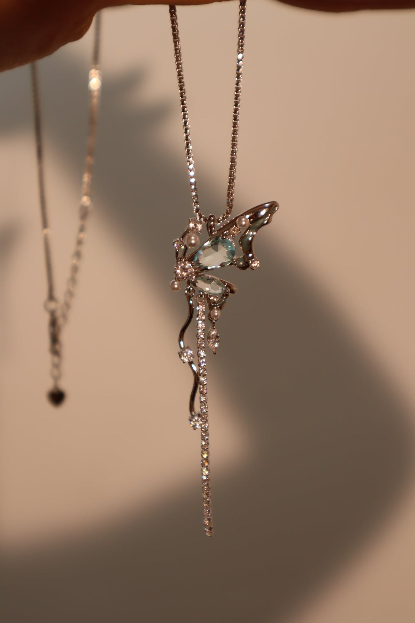 Palladium White Gold Plated Blue Gem Butterfly Necklace