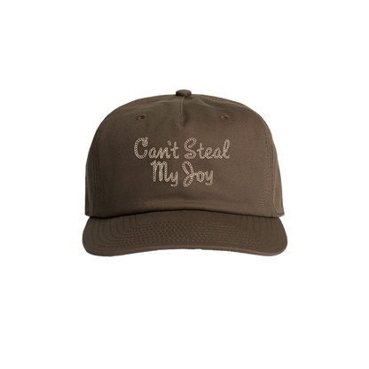 A brown baseball cap with the text 'Can't Steal My Joy' embroidered on the front.