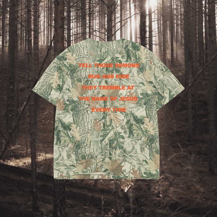 T-shirt with text design in a forest setting