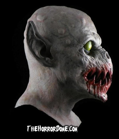 Feast Monster's distinct upturned snout and bumpy skull design"