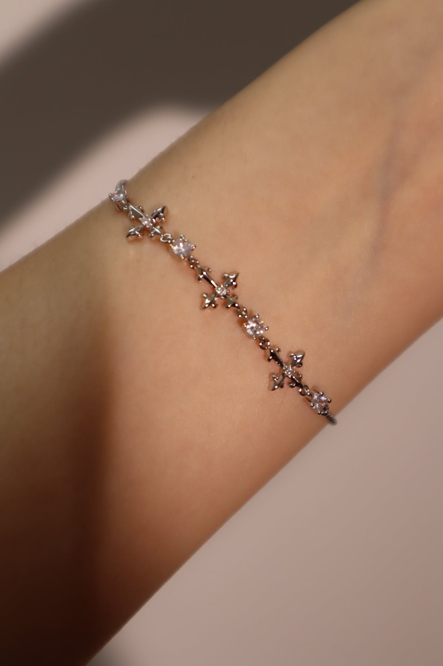 Palladium White Gold Plated Multi Diamond Cross Bracelet