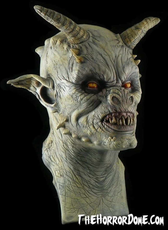Detailed view of Stone Gargoyle's menacing snout and golden eyes